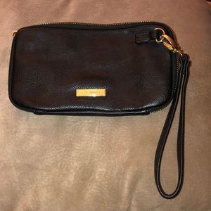 Gently used Steve Madden wristlet :)